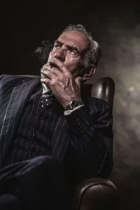 A moody vintage 1970s mafia aesthetic scene representing the atmospheric underworld in decoding The Godfather.
