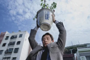 Stylized No Other Choice Park Chan-wook AI analysis illustration: Man-su, a veteran Korean paper worker, facing technological displacement and job loss.
