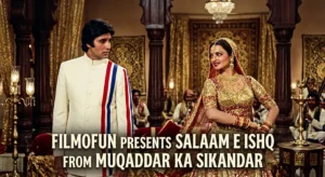 Amitabh Bachchan in a white sherwani looking at Rekha dancing in a golden lehenga during the Salaam-e-Ishq song sequence.